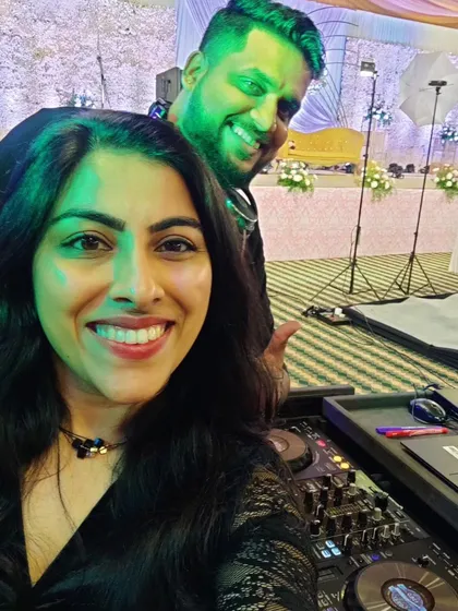 A behind-the-console selfie with the DJ. Teamwork makes the dream work, and our synergy ensures a seamless audio-visual experience for your wedding celebration.