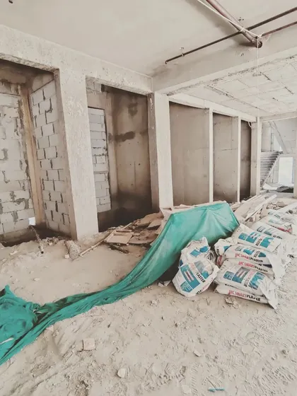 Interior of the Mathura Road commercial project, showing AAC blockwork for partition walls being installed.