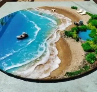Another stunning example of beach art you can create. My workshop covers techniques for making 3D islands and realistic shorelines with real sand.
