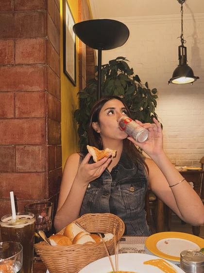 The perfect bite. A fun shot capturing the joy of good food.