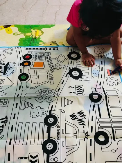 This reusable coloring mat is a lifesaver for keeping kids engaged after school. Just color, wash, and repeat. It's great for quiet time or playdates.