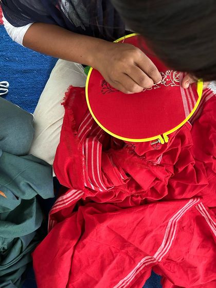 Another look at the embroidery process. Each stitch is a labor of love, reflecting the essence of India's rich craft heritage.