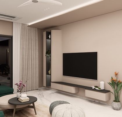 An open-plan living and dining concept for SVASA 2A, where a cohesive beige color scheme unifies the space. A bold green sofa and matching dining chairs add a touch of vibrant energy, while a flowing ceiling detail with cove lighting connects the two zones.