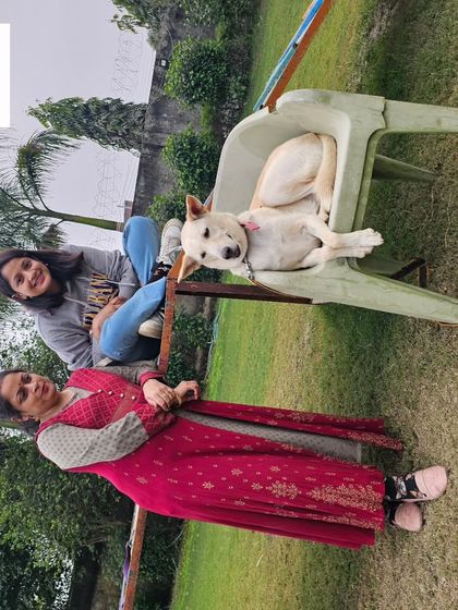 Happy clients relaxing with their happy dog, Alex. We love seeing our extended Oma family together.