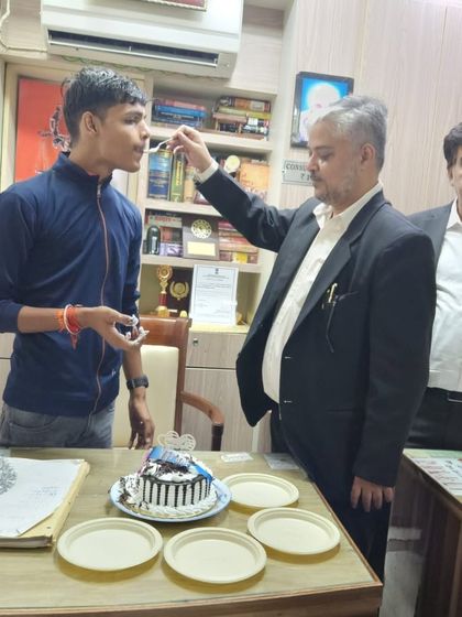 My colleague and I celebrating with the birthday boy. I am proud to mentor such promising individuals.