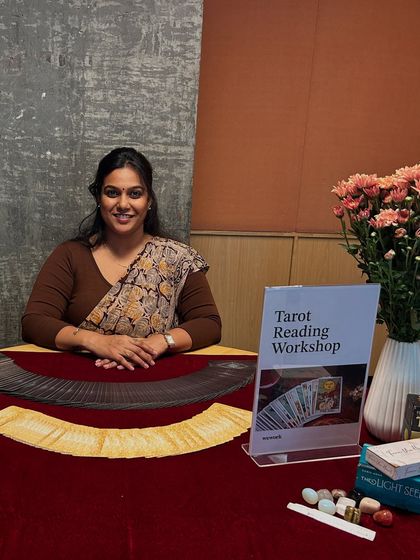 Here I am at a wellness event for WeWork, ready for a Tarot Reading Workshop. It's wonderful to see workplaces embrace tools for self-reflection and wellness. The setup was complete with fresh flowers and my favorite decks.