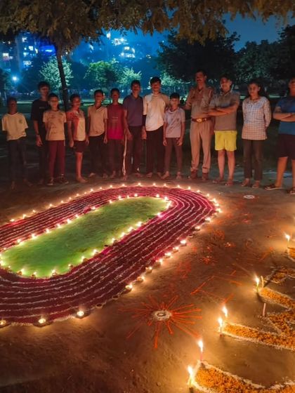 The team posing with our complete Diwali artwork. It was a great evening of celebration after our training.