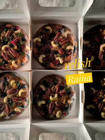 Six round Christmas plum cakes, rich and dense with fruits and nuts. I take great pride in baking, packing, and dispatching these every year.