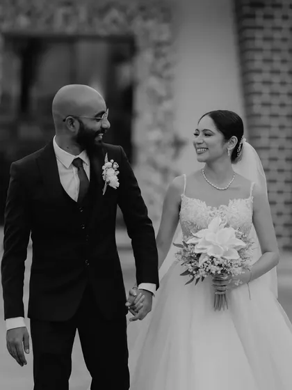After the vows, after the tears of joy, there's this quiet walk of a newly married couple. This is a candid moment from a beautiful Christian wedding, full of peace and happiness.