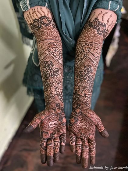 Another angle of this beautiful bridal design, showcasing the consistency and flow of the patterns from the palm to the forearm.