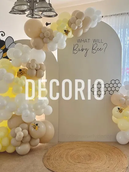 Gender reveals should be fun and unique, like this "What will Baby Bee?" theme. I use a clean, modern backdrop with custom text and a balloon arch in soft yellows and whites, accented with cute bee details for a playful touch.