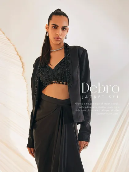 A close-up of the Debro Jacket Set, highlighting the embellished lapels of the satin blazer and the matching bralette.
