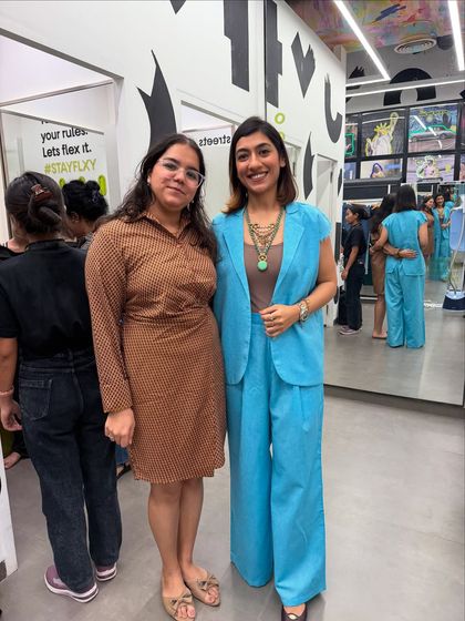 Posing with another client who found her perfect look during my in-store styling session.