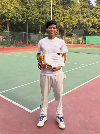 A wider shot of Lokesh celebrating his achievement. Reaching a tournament final is a huge step that reflects countless hours of practice and discipline.