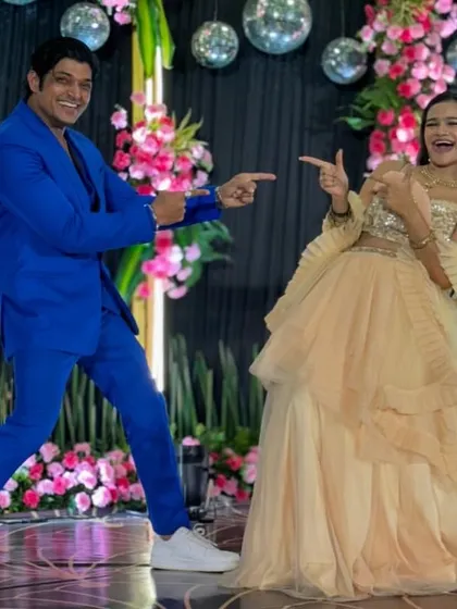 Sharing a fun, playful moment on the dance floor with one of the guests.