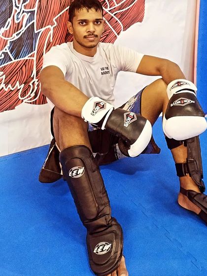 Taking a moment to rest after some good striking rounds. The grind is constant, but it's important to recover.