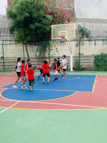 A player takes a shot during a shooting drill.