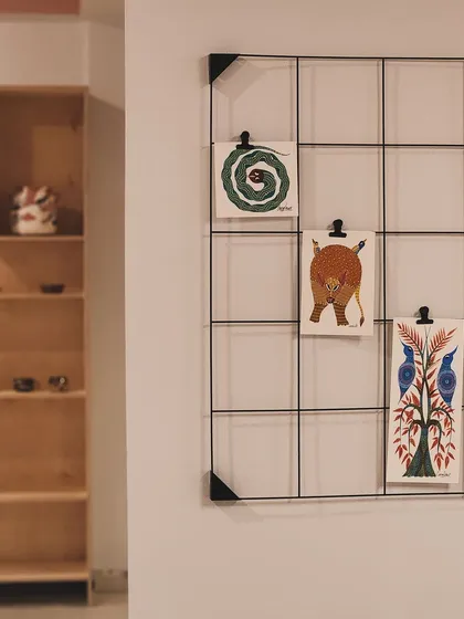 We love showcasing art that inspires us. This little gallery wall is a corner of our studio that features beautiful Gond art.