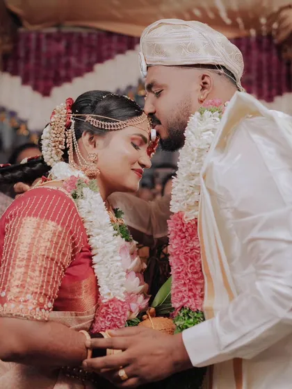 A sweet and traditional moment, with the groom kissing the bride's forehead. This is a classic gesture of love and blessing that I always make sure to capture.