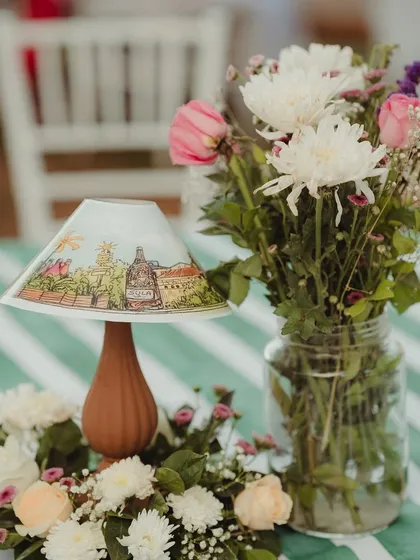 Another view of the beautiful hand-painted lamp, showcasing how art and decor can be seamlessly blended to tell a story.