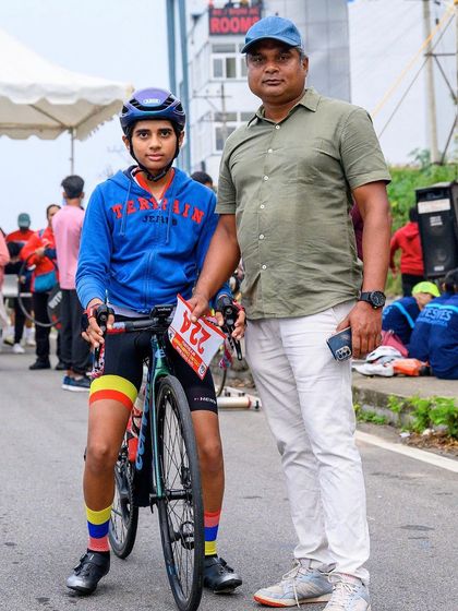 A young U-14 champion with his father and coach after the State Championships. We believe in nurturing talent from a young age and providing a supportive ecosystem for them to grow.