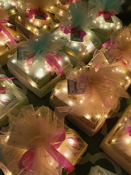 Add a touch of magic to your gifts with our signature light-up hampers. These beautifully wrapped baskets, illuminated with warm fairy lights, create an enchanting presentation that makes any occasion feel extra special.