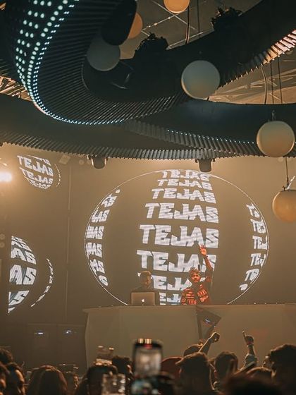 My name on a global display at Prism, surrounded by the club's unique design.