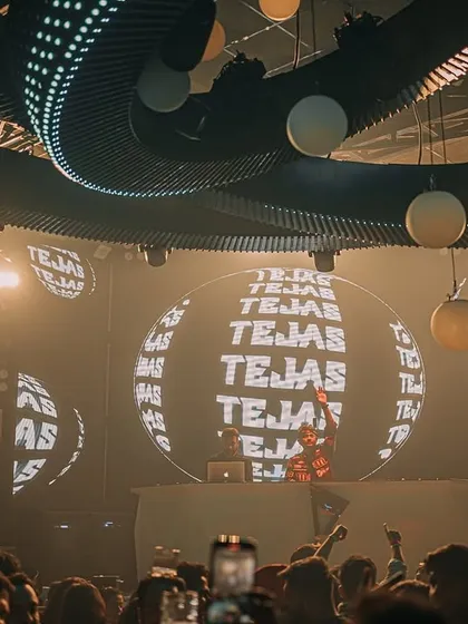 My name on a global display at Prism, surrounded by the club's unique design.