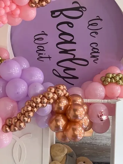 A close-up of our 'We Can Bearly Wait' decor, showcasing the mix of lavender, pink, and metallic rose gold balloons for a touch of glam.