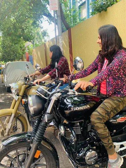 Two graduates on their bikes, ready for a ride. The skills they learned have opened up a new world of shared adventures.