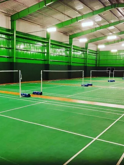 A clear view of our BWF-approved Li-Ning synthetic courts, ready for action. We ensure our courts are always clean and well-maintained for the best playing experience.