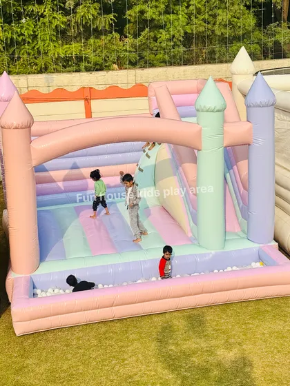 See the joy on their faces in our Pastel Paradise Castle. The soft, photogenic colors make it a favorite for themed birthday parties, complete with a fun slide and a ball pit for endless entertainment.