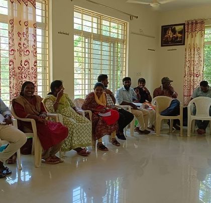 A group of educators listening intently during the workshop, ready to apply new insights to their work with children.