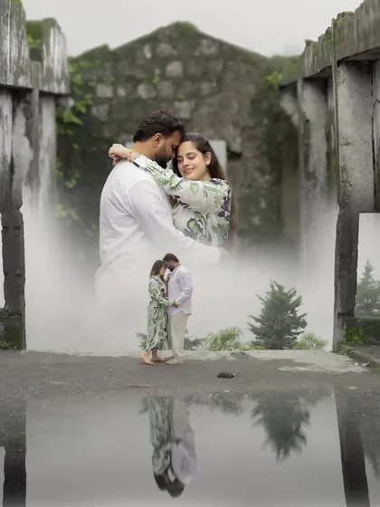 A creative double-exposure pre-wedding photograph combining an intimate embrace with a misty, rustic location, reflecting the couple's deep connection and the atmosphere of their chosen destination.