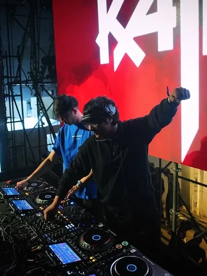 A shot of me and my partner Amare during our B2B set opening for Talwiinder. Two DJs, one massive sound.