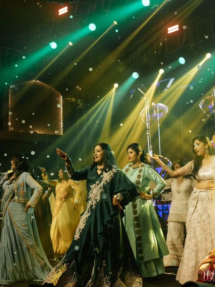 The ladies of the family owning the stage with their coordinated and graceful performance.