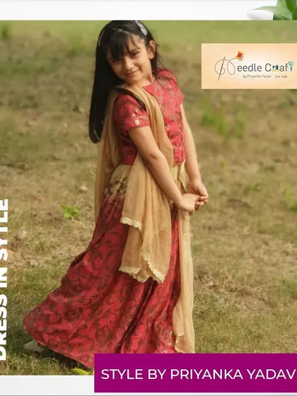 A beautiful red printed ethnic dress paired with a golden dupatta. This is a versatile piece that can be worn for various festive occasions, designed with soft fabric for comfort.