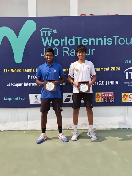 Pradyumna and Om with their runners-up plaques at the ITF World Tennis Tour J30 event. Competing in these tournaments is crucial for gaining international ranking points.