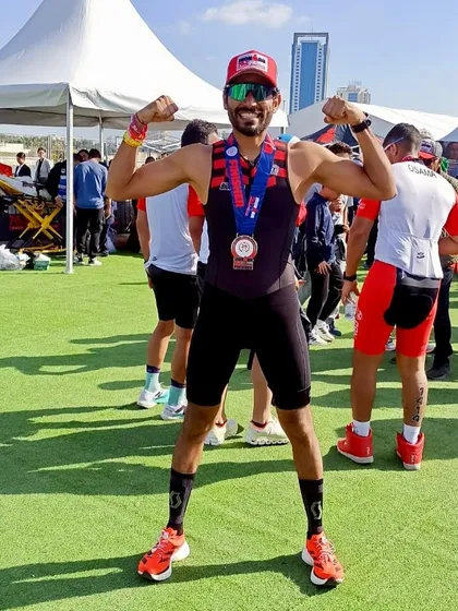 The feeling of accomplishment after finishing an Ironman 70.3. Here, our member Deepak proudly displays his finisher's medal, a testament to his incredible comeback and dedication.