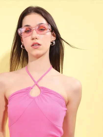A duplicate of the pink halter top look, emphasizing the clean and fresh aesthetic of the summer collection.