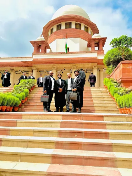My team, standing strong on the steps of the Supreme Court of India.