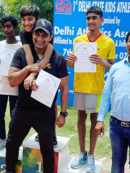 A proud moment for me and my son, as he becomes the fastest boy in Delhi (Under-12) and I get to do the medal ceremony.