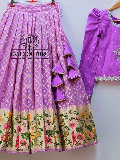 A purple version of the long-sleeved lehenga set, showcasing the variety of colors available for twinning outfits.
