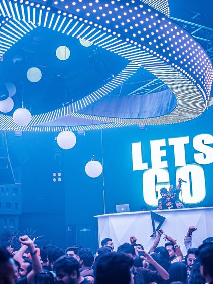 The 'Lets Go' visual on screen, kicking off the set at Prism.