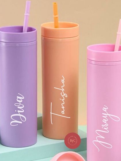 Our candy crush tumblers are a customer favorite. This shot shows our pretty pastel options, each personalised with a name in a delicate script.