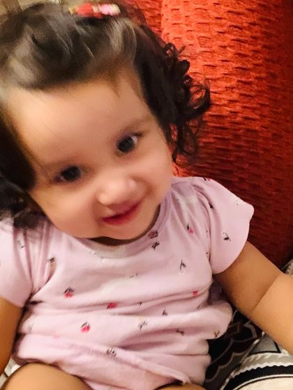 Another close-up of my daughter, just before she turned one. Her toothy grin melts my heart every time.