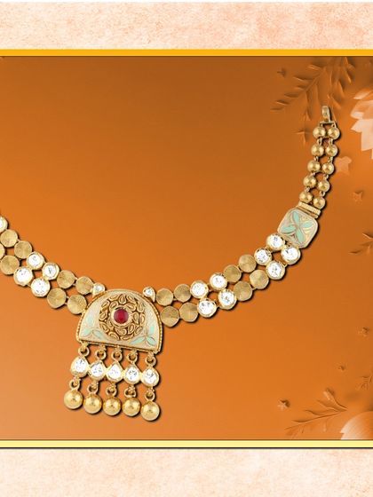 To the women who sparkle with resilience. This necklace features a unique design with white enamel and red stone accents, perfect for making a subtle statement.