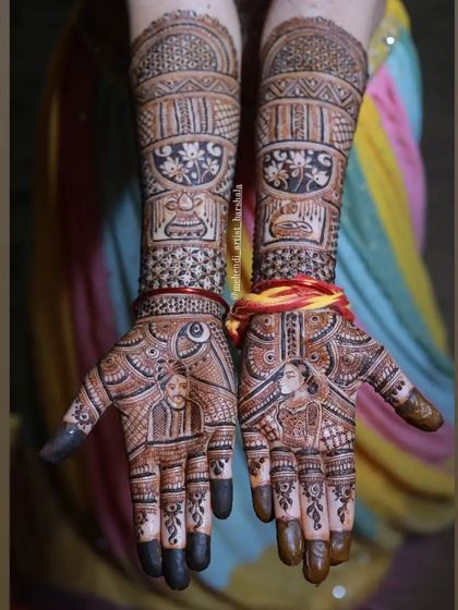 This bridal design combines personalized portraits with traditional symbols. On the palms, you can see the bride and groom, while the arms feature classic wedding elements like a kalash.