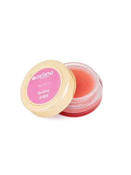 This strawberry lip balm is made with organic beeswax and essential oils to make your lips smooth and silky. It absorbs quickly without feeling greasy or chalky.