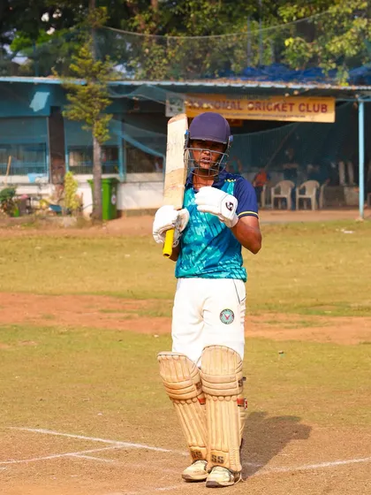A player ready at the crease, warming up for the T20 President's Cup challenge.